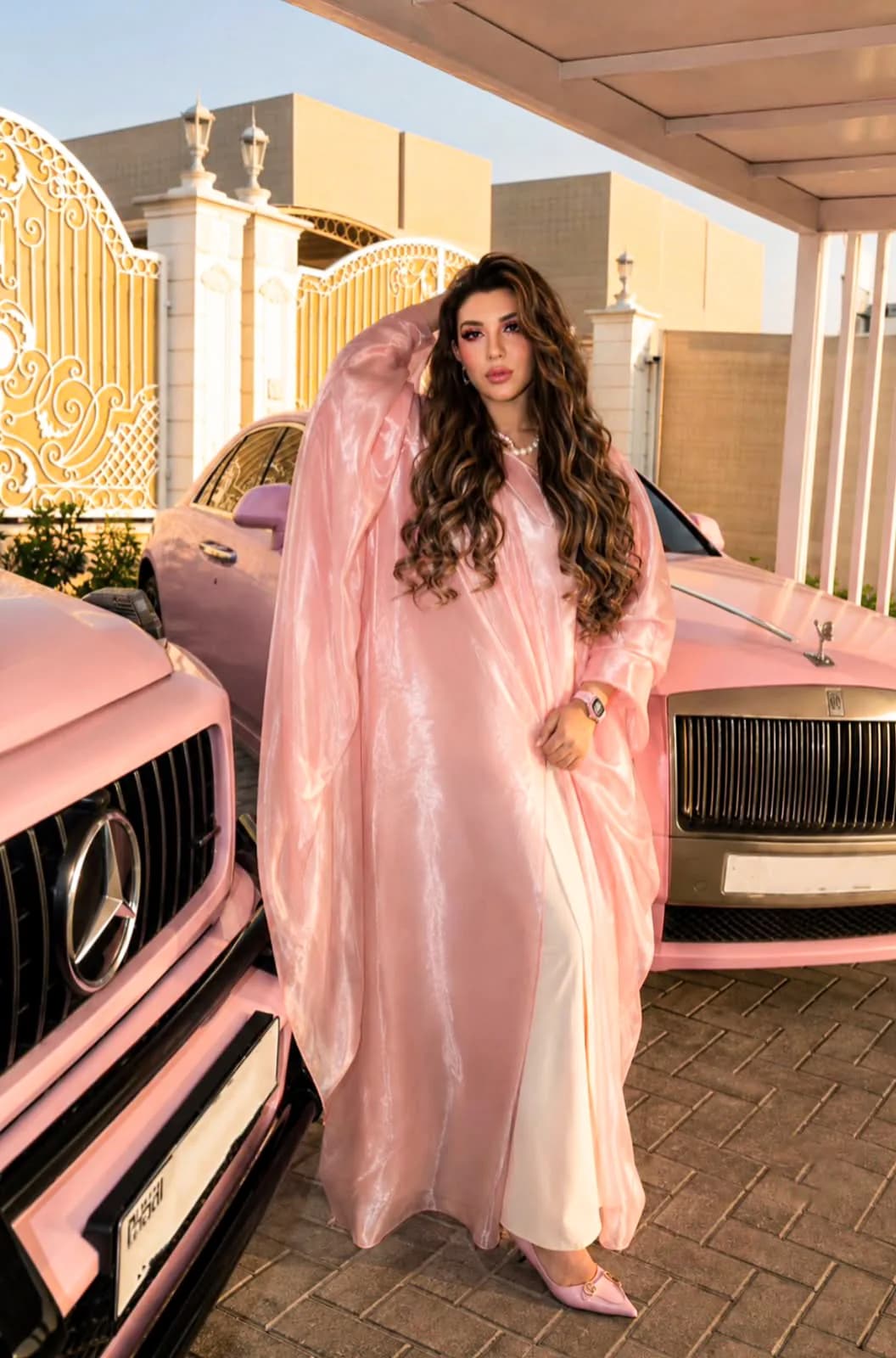 Almas Anfar Kathuria in a lifestyle editorial with classic cars
