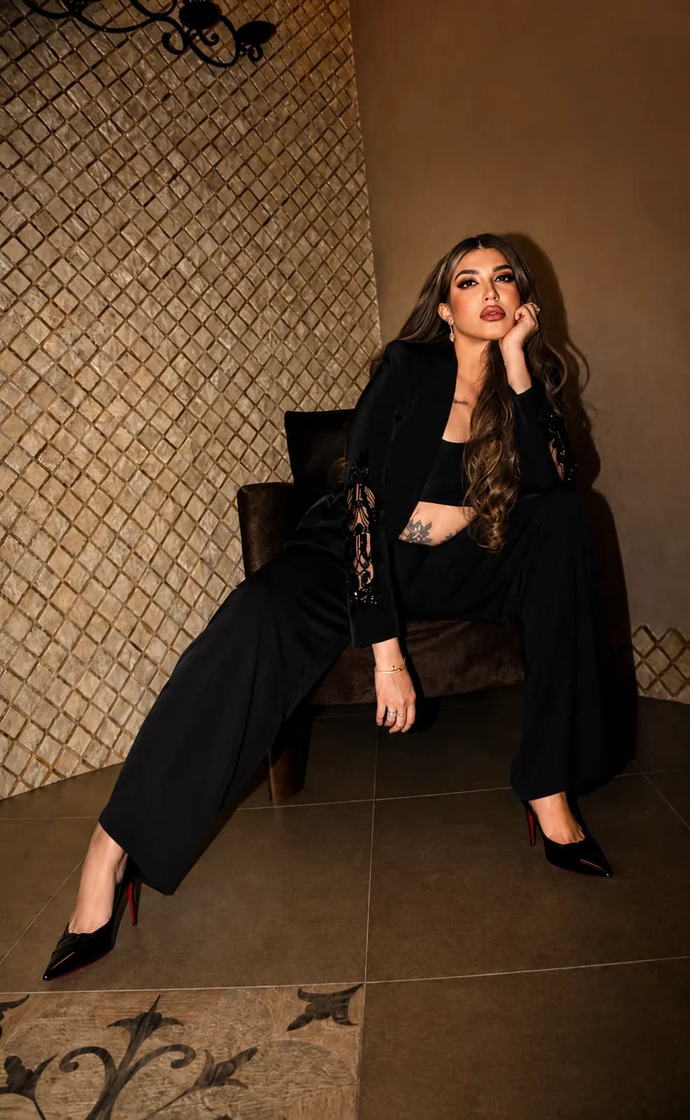 Almas Anfar Kathuria in a power suit portrait